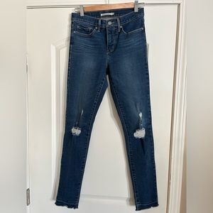 Levi’s women’s 311 distressed jeans